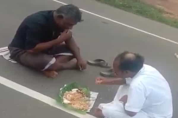 போதையில் சாலையின் நடுவே உட்கார்ந்து சாப்பிட்ட அதிமுக பிரமுகர் ?